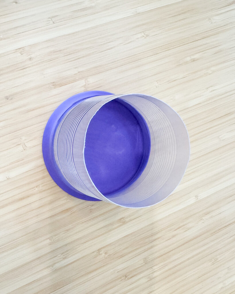 Picture shows the balloon on the cup completing the marshmallow launcher.